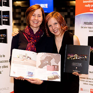 2 women in front of banner at Innovate Oeiras Launch